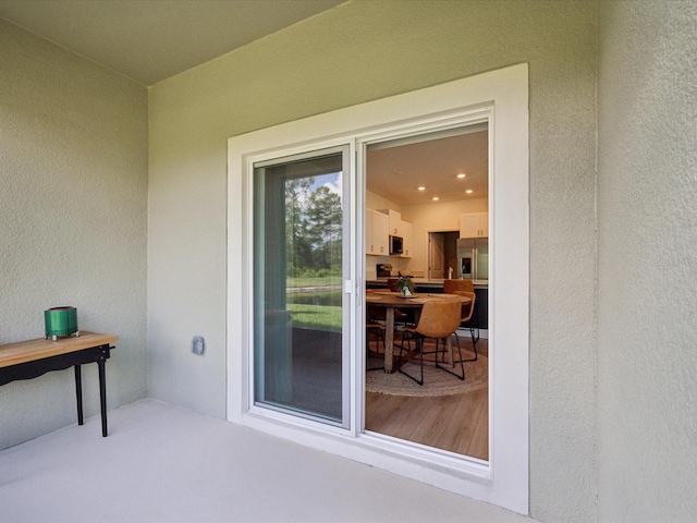 17729 Nectar Flume Dr, Land O Lakes, FL 34638 - property entrance with stucco siding