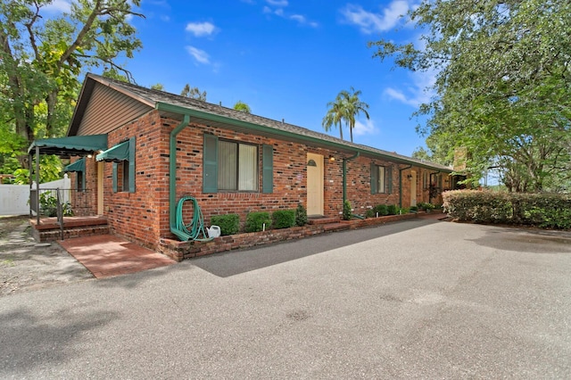 3005 W Sligh Ave, Tampa, FL 33614 - ranch-style house featuring brick siding