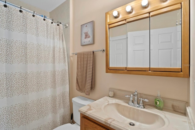 3005 W Sligh Ave, Tampa, FL 33614 - full bathroom with toilet, vanity, and a shower with shower curtain