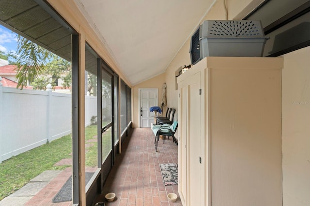 3005 W Sligh Ave, Tampa, FL 33614 - sunroom featuring brick floors and lofted ceiling