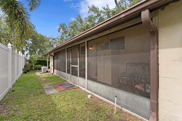 3005 W Sligh Ave, Tampa, FL 33614 - view of yard featuring central air condition unit and a sunroom