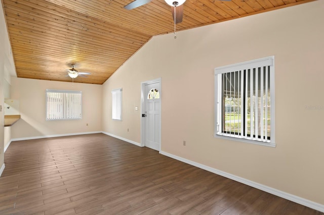 3005 W Sligh Ave, Tampa, FL 33614 - unfurnished living room featuring ceiling fan, plenty of natural light, wood ceiling, baseboards, and lofted ceiling