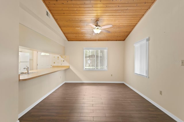 3005 W Sligh Ave, Tampa, FL 33614 - spare room with plenty of natural light, lofted ceiling, ceiling fan, wooden ceiling, and dark wood-style flooring