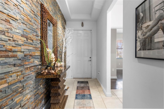 9931 Victory Gallop Loop, Ruskin, FL 33573 - entryway featuring light tile patterned floors and baseboards
