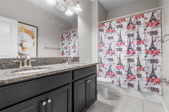 9931 Victory Gallop Loop, Ruskin, FL 33573 - bathroom featuring tile patterned flooring, toilet, shower / bath combo, and double vanity