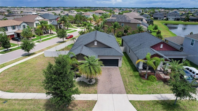 9931 Victory Gallop Loop, Ruskin, FL 33573 - aerial view of residential area with a large body of water