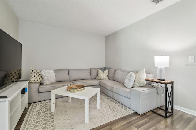 4528 Winding River Way, Land O Lakes, FL 34639 - living area featuring wood finished floors and baseboards