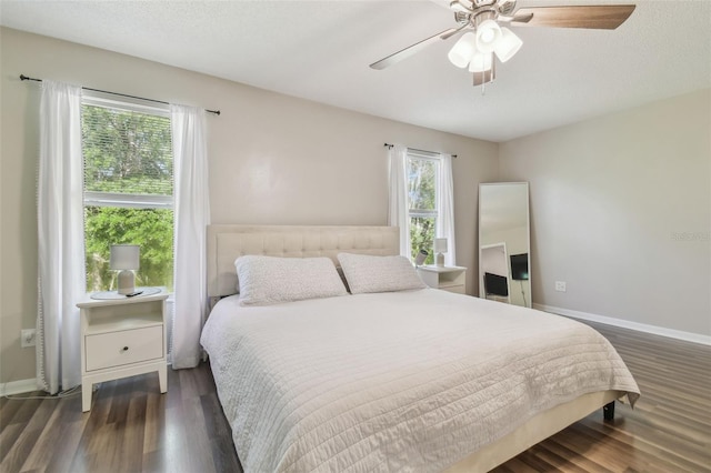 4528 Winding River Way, Land O Lakes, FL 34639 - bedroom featuring wood finished floors, baseboards, and ceiling fan