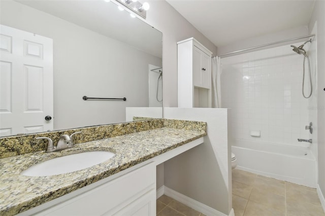 4528 Winding River Way, Land O Lakes, FL 34639 - full bath with tile patterned floors, toilet, vanity, bathing tub / shower combination, and baseboards