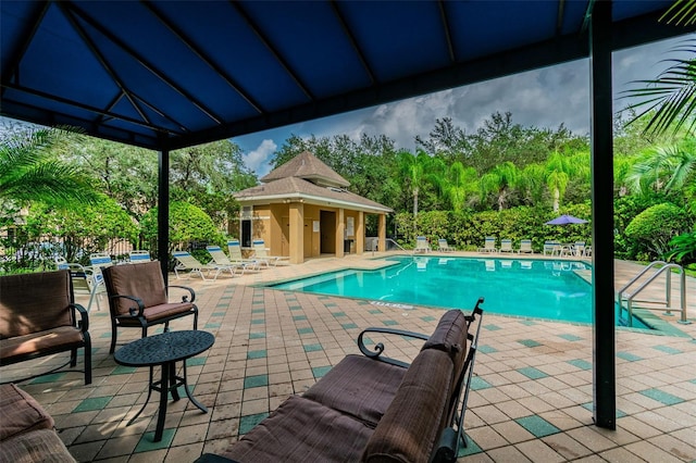 4528 Winding River Way, Land O Lakes, FL 34639 - community pool with a patio area