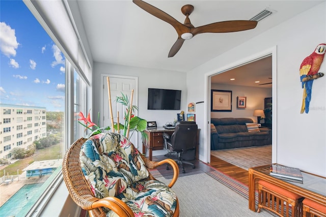 2960 59th St S Unit 614, Gulfport, FL 33707 - home office with a ceiling fan and wood finished floors