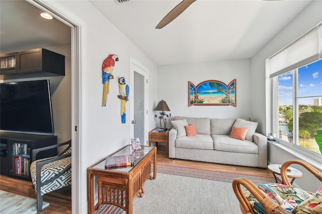 2960 59th St S Unit 614, Gulfport, FL 33707 - living area featuring wood finished floors and a ceiling fan
