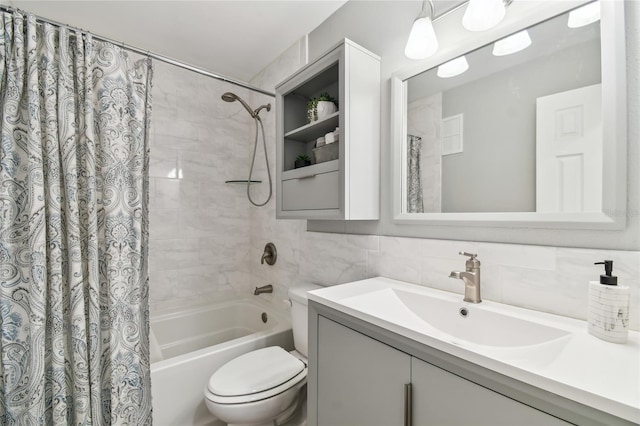 2960 59th St S Unit 614, Gulfport, FL 33707 - bathroom featuring shower / bath combo, toilet, vanity, and decorative backsplash