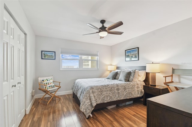 2960 59th St S Unit 614, Gulfport, FL 33707 - bedroom featuring a closet, wood finished floors, baseboards, and ceiling fan