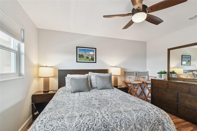 2960 59th St S Unit 614, Gulfport, FL 33707 - bedroom featuring dark wood finished floors and ceiling fan
