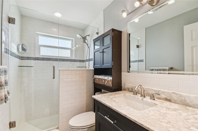 2960 59th St S Unit 614, Gulfport, FL 33707 - full bathroom featuring a shower stall, toilet, and vanity