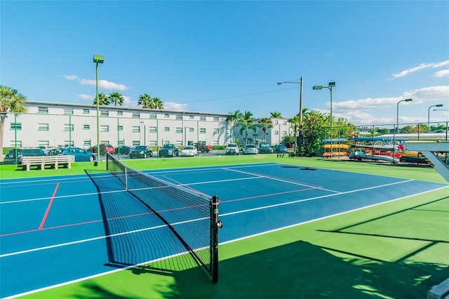 2960 59th St S Unit 614, Gulfport, FL 33707 - view of tennis court featuring fence and community basketball court