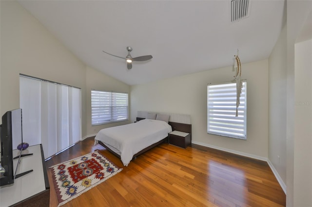 14502 Pond Cypress Way, Tampa, FL 33626 - bedroom with lofted ceiling, wood finished floors, ceiling fan, and baseboards