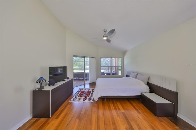 14502 Pond Cypress Way, Tampa, FL 33626 - bedroom with light wood-style floors, baseboards, a ceiling fan, and high vaulted ceiling