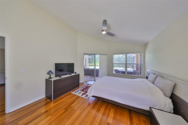 14502 Pond Cypress Way, Tampa, FL 33626 - bedroom with light wood finished floors, vaulted ceiling, and a ceiling fan