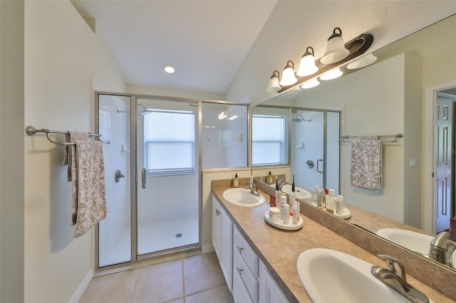 14502 Pond Cypress Way, Tampa, FL 33626 - full bathroom featuring a stall shower, tile patterned flooring, double vanity, baseboards, and lofted ceiling