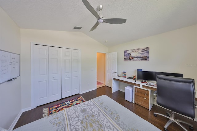 14502 Pond Cypress Way, Tampa, FL 33626 - home office with a ceiling fan, vaulted ceiling, wood finished floors, baseboards, and a textured ceiling