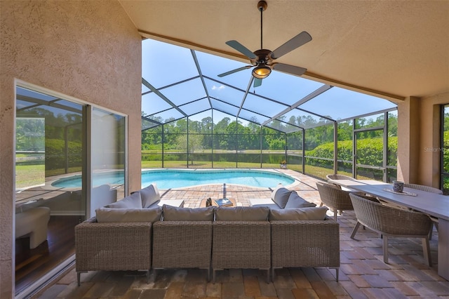 14502 Pond Cypress Way, Tampa, FL 33626 - swimming pool with an outdoor hangout area, a patio area, a lanai, a ceiling fan, and outdoor dining area