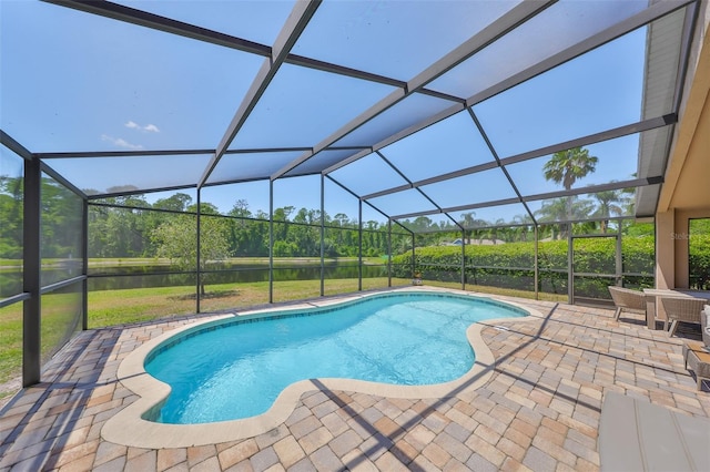 14502 Pond Cypress Way, Tampa, FL 33626 - outdoor pool featuring a patio and glass enclosure