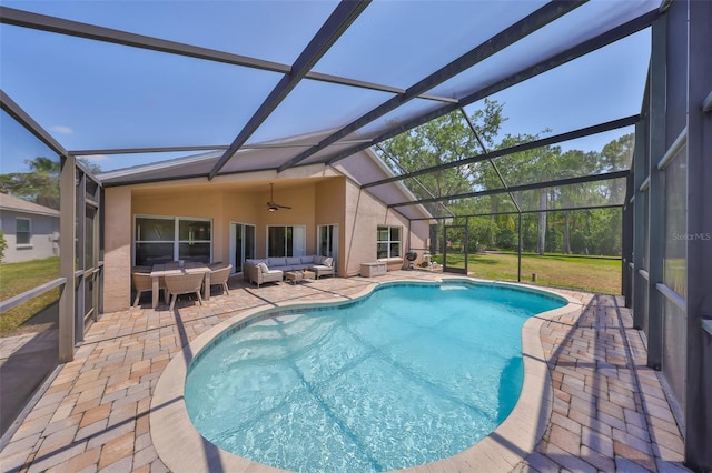 14502 Pond Cypress Way, Tampa, FL 33626 - swimming pool featuring outdoor lounge area, a patio area, a ceiling fan, and a lanai