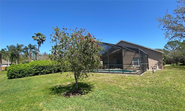 14502 Pond Cypress Way, Tampa, FL 33626 - view of green lawn featuring an outdoor pool and glass enclosure