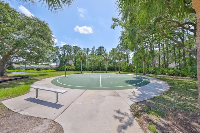 14502 Pond Cypress Way, Tampa, FL 33626 - view of sport court with community basketball court and a lawn
