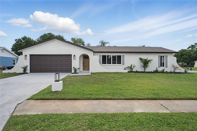 2815 Golfview Dr, Melbourne, FL 32901 - ranch-style home with a garage, a front lawn, stucco siding, and concrete driveway