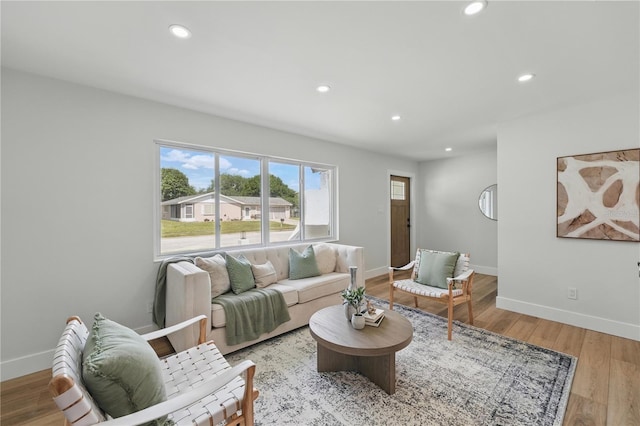 2815 Golfview Dr, Melbourne, FL 32901 - living room with healthy amount of natural light, recessed lighting, baseboards, and light wood finished floors