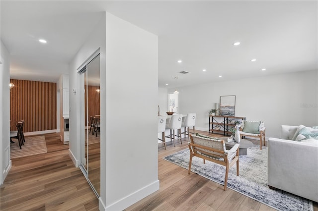 2815 Golfview Dr, Melbourne, FL 32901 - living area with wood finished floors, baseboards, and recessed lighting