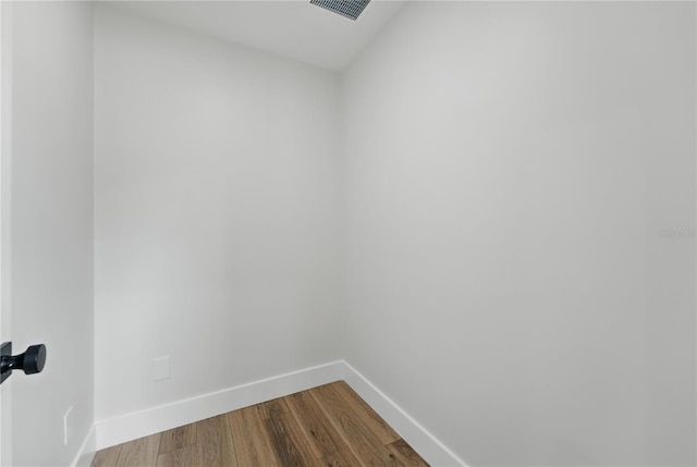 2815 Golfview Dr, Melbourne, FL 32901 - unfurnished room featuring baseboards and wood finished floors
