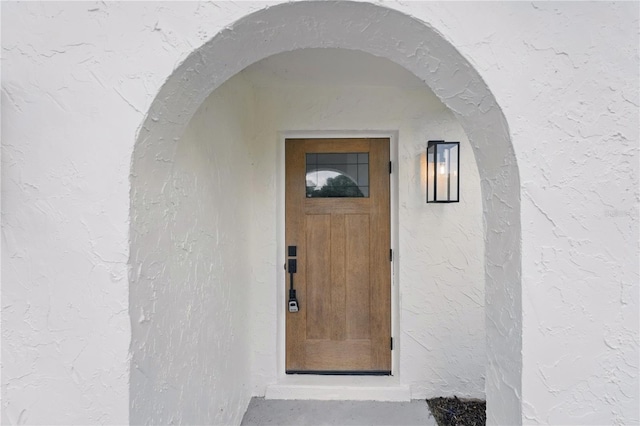 2815 Golfview Dr, Melbourne, FL 32901 - view of exterior entry featuring stucco siding
