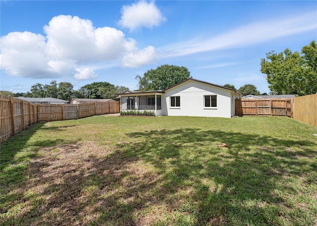 2815 Golfview Dr, Melbourne, FL 32901 - view of yard with a sunroom