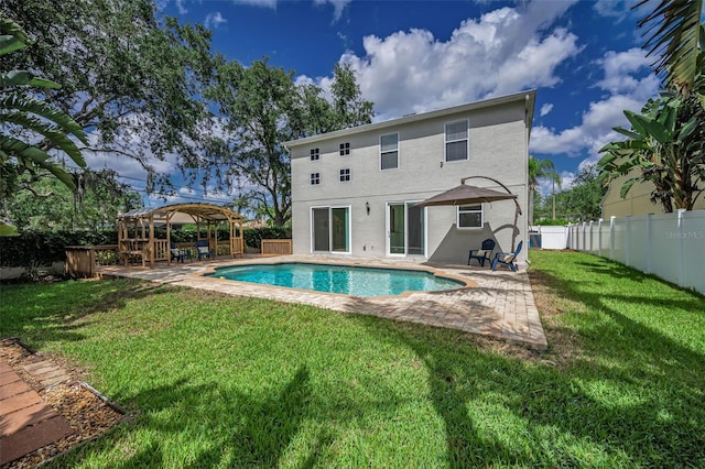 3002 Savannah Oaks Cir, Tarpon Springs, FL 34688 - rear view of property with a patio, stucco siding, and a pergola