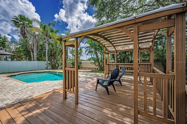3002 Savannah Oaks Cir, Tarpon Springs, FL 34688 - view of pool featuring a wooden deck, a fenced backyard, and a patio