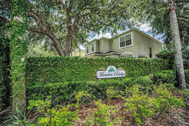 3002 Savannah Oaks Cir, Tarpon Springs, FL 34688 - view of front facade featuring stucco siding