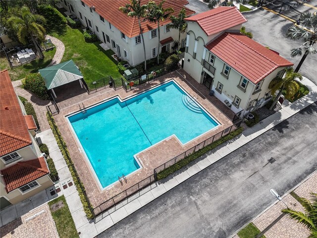21115 NW 14th Pl Unit 2, Miami, FL 33169 - community pool with fence and a gazebo