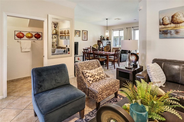 21115 NW 14th Pl Unit 2, Miami, FL 33169 - living room with light tile patterned flooring and baseboards