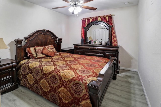 21115 NW 14th Pl Unit 2, Miami, FL 33169 - bedroom with light wood finished floors, baseboards, and ceiling fan