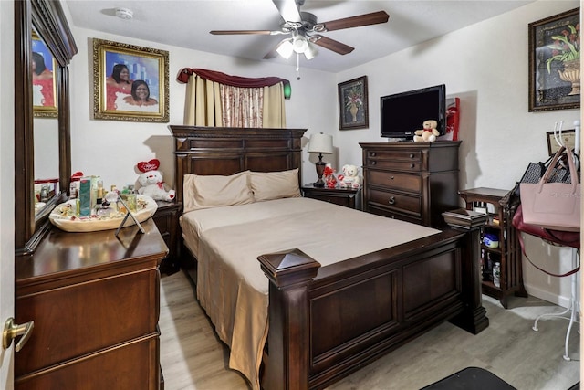 21115 NW 14th Pl Unit 2, Miami, FL 33169 - bedroom featuring light wood-style floors and a ceiling fan
