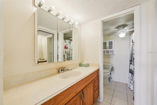 6020 S Shore Blvd Unit 709, Gulfport, FL 33707 - full bath with a textured ceiling, vanity, tile patterned floors, curtained shower, and ceiling fan