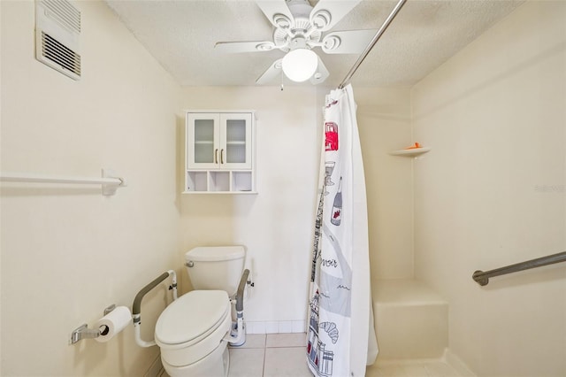 6020 S Shore Blvd Unit 709, Gulfport, FL 33707 - bathroom with a ceiling fan, tile patterned floors, and a textured ceiling