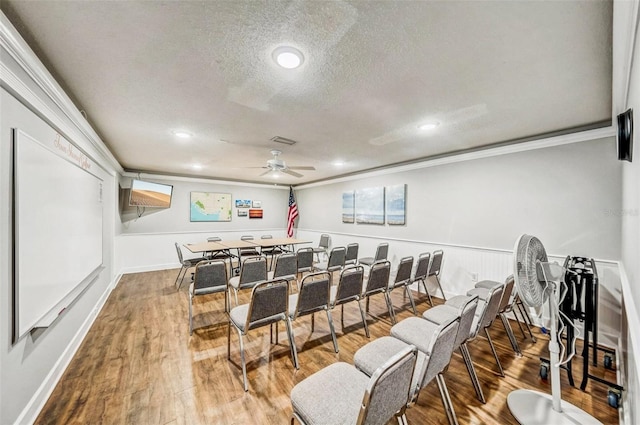 6020 S Shore Blvd Unit 709, Gulfport, FL 33707 - cinema room with a ceiling fan, a textured ceiling, crown molding, wood finished floors, and recessed lighting