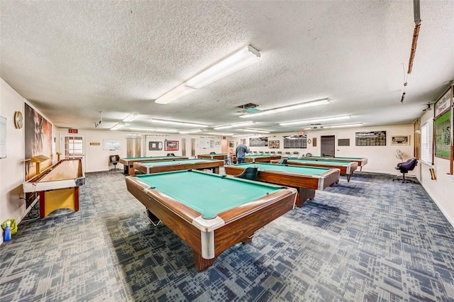 6020 S Shore Blvd Unit 709, Gulfport, FL 33707 - game room with billiards, a textured ceiling, and carpet flooring