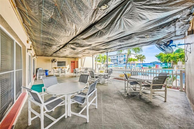 6020 S Shore Blvd Unit 709, Gulfport, FL 33707 - view of patio / terrace with outdoor dining area