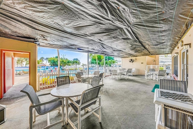 6020 S Shore Blvd Unit 709, Gulfport, FL 33707 - view of patio featuring outdoor dining area